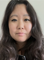 Person posing for headshot